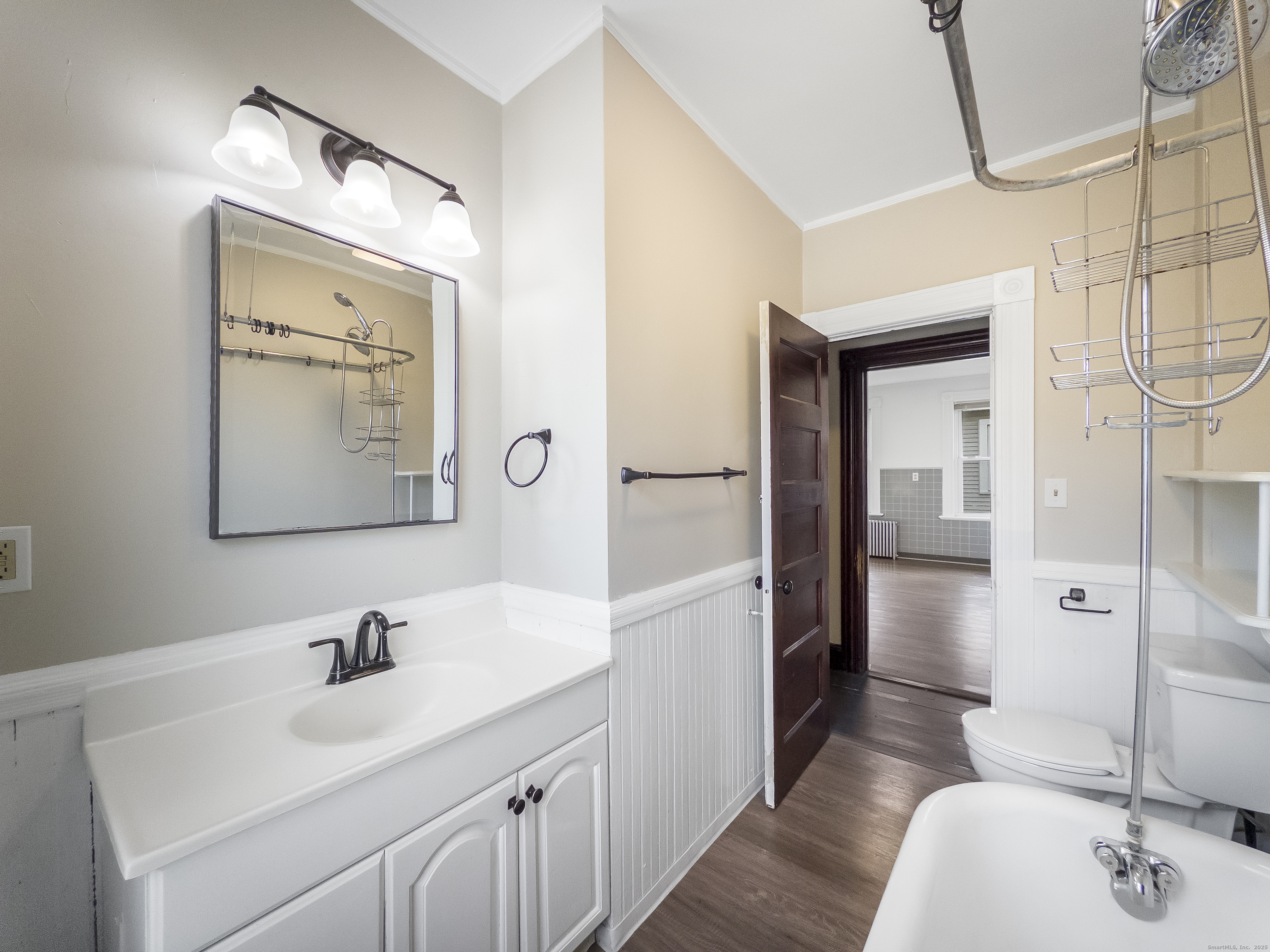 634 High Street, Unit 2 Middletown, CT 06457 - Photo 10 of 15 a bathroom with a sink and a mirror