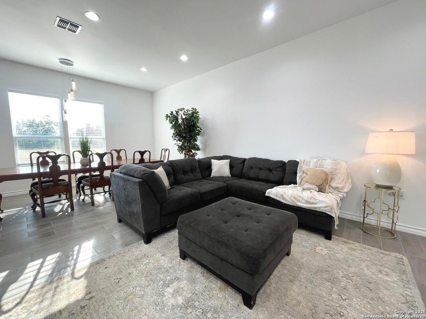 97 Berwick Road Victoria, TX 77904 - Photo 5 of 35 a living room with furniture and wooden floor