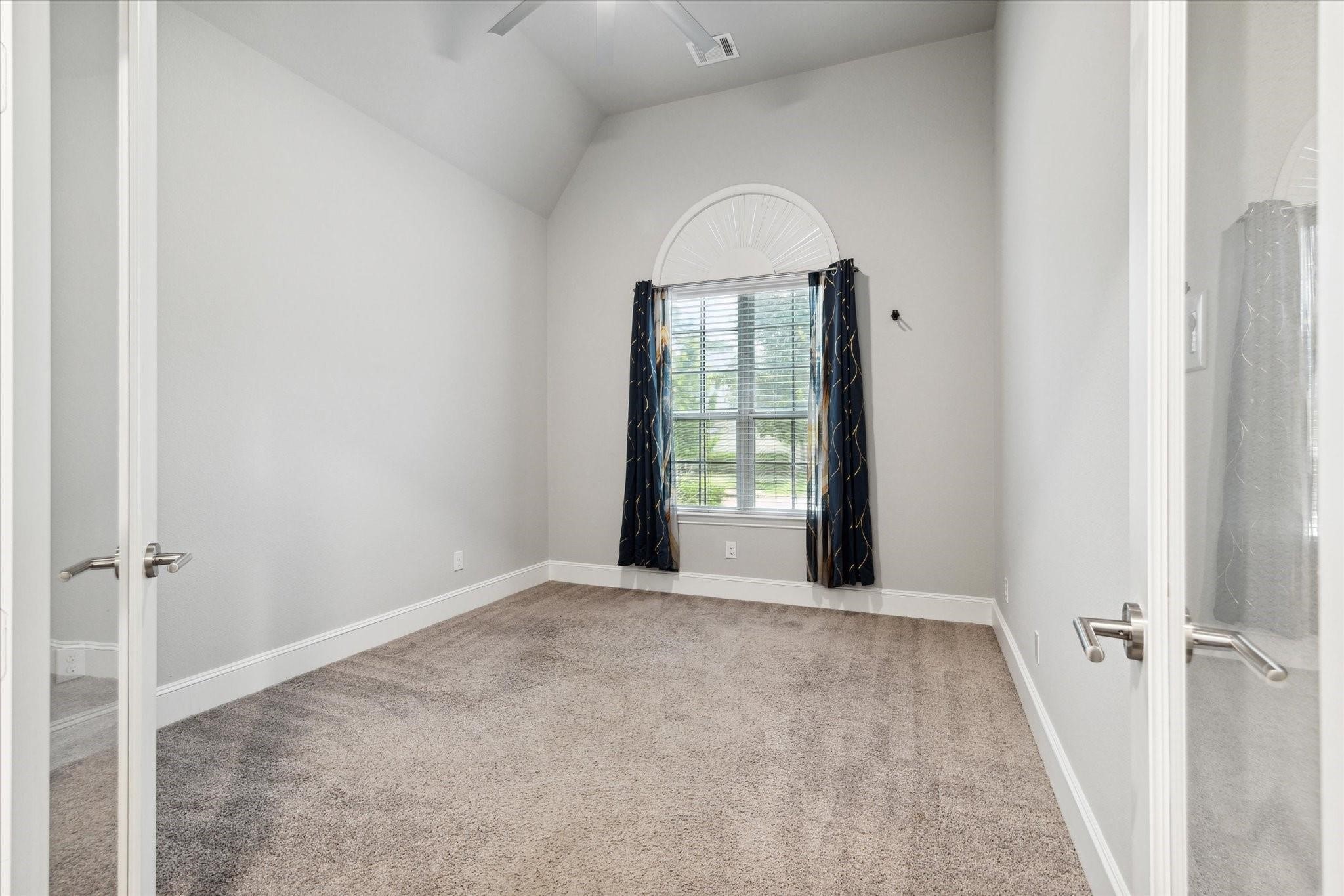 1010 Bat Hawk Court Conroe, TX 77385 - Photo 5 of 50 an empty room with windows