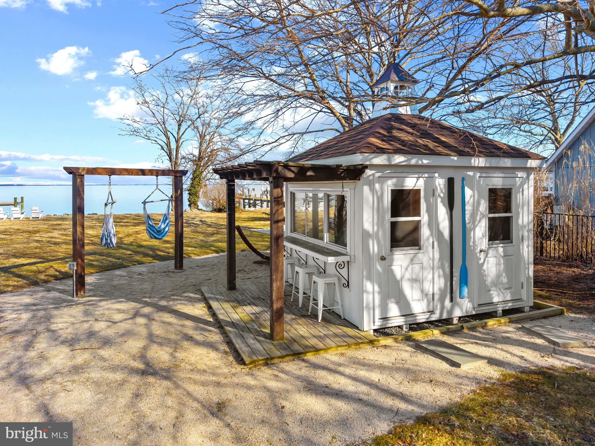 122 Queen Anne Road Stevensville, MD 21666 - Photo 35 of 39 Relax by the tiki bar and hammock