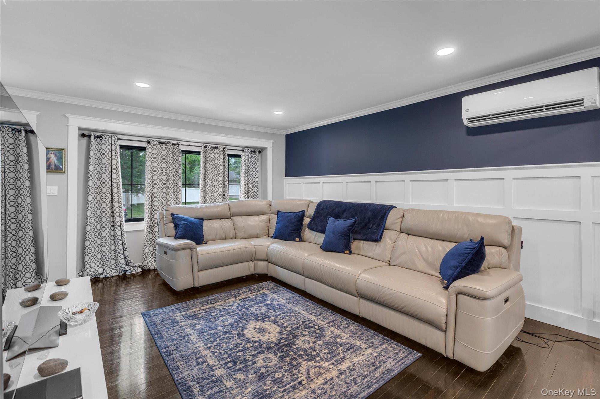 31 Apple Lane Commack, NY 11725 - Photo 3 of 28 Wood flooring, plenty of windows to let in natural light, recessed lighting.