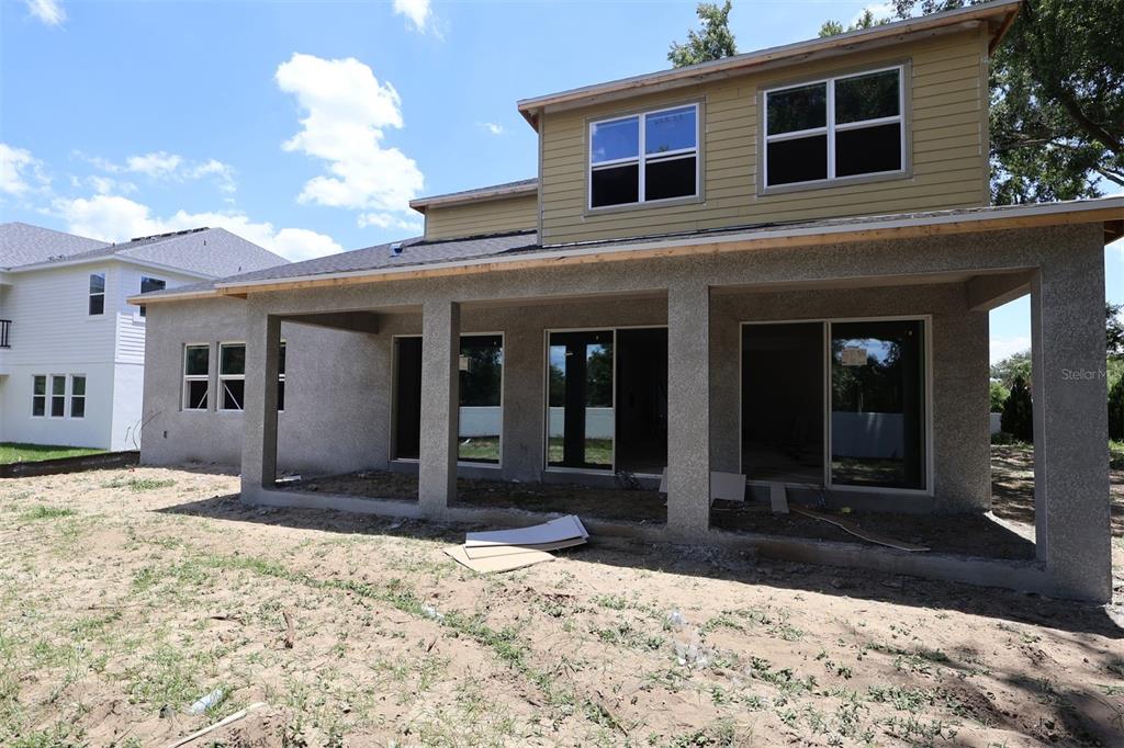 3850 Wolves Crk Place Apopka, FL 32712 - Photo 2 of 11 a view of a house with a yard