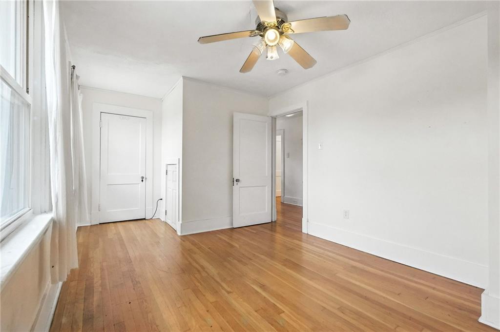 5248 Beelermont Place Pittsburgh, PA 15217 - Photo 21 of 36 a view of an empty room with wooden floor