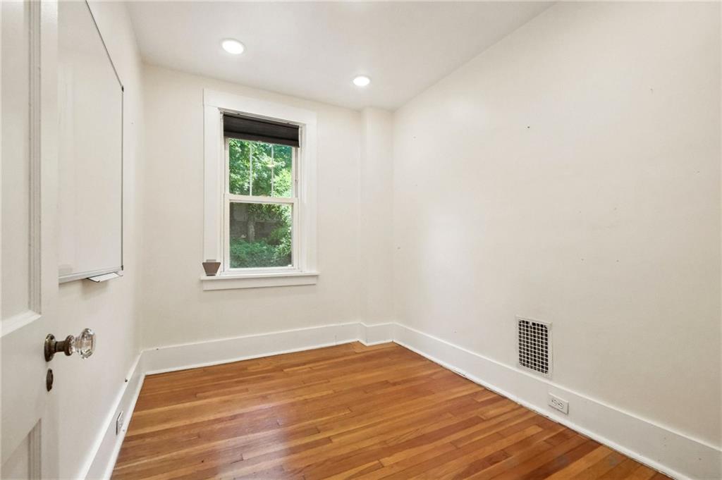 5248 Beelermont Place Pittsburgh, PA 15217 - Photo 23 of 36 a view of empty room with wooden floor and fan