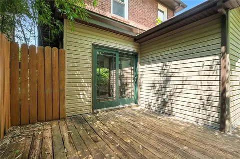 a view of balcony and yard