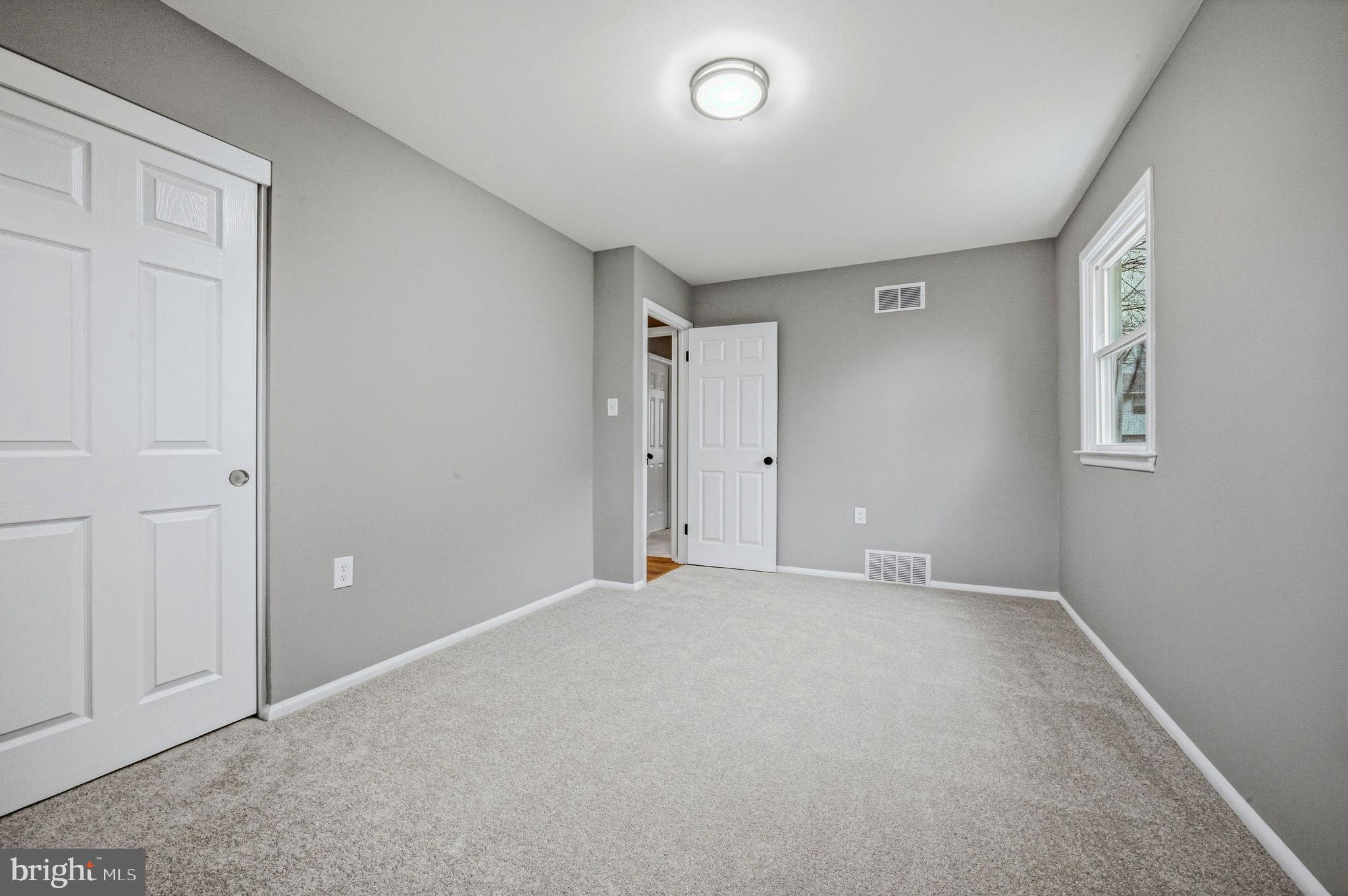 1302 Stanford Road Wilmington, DE 19803 - Photo 27 of 39 Spacious, versatile room with natural light.