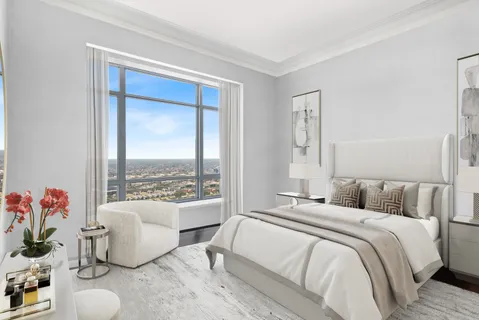 a bathroom with a sink mirror and toilet