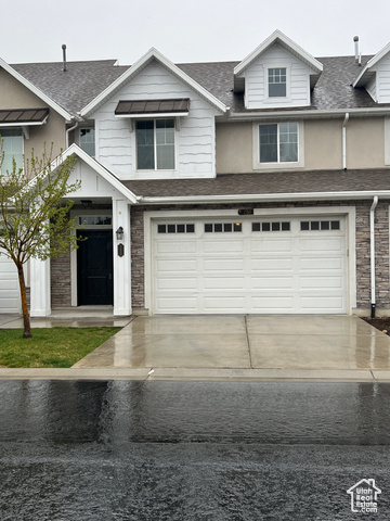 View of front of home with a garage