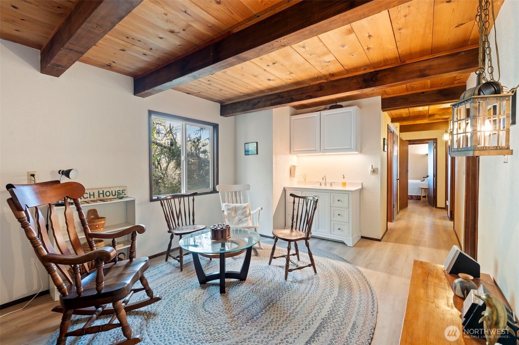 326 Harbor View Loop Southeast Ocean Shores, WA 98569 - Photo 17 of 38 a dining room with furniture and window