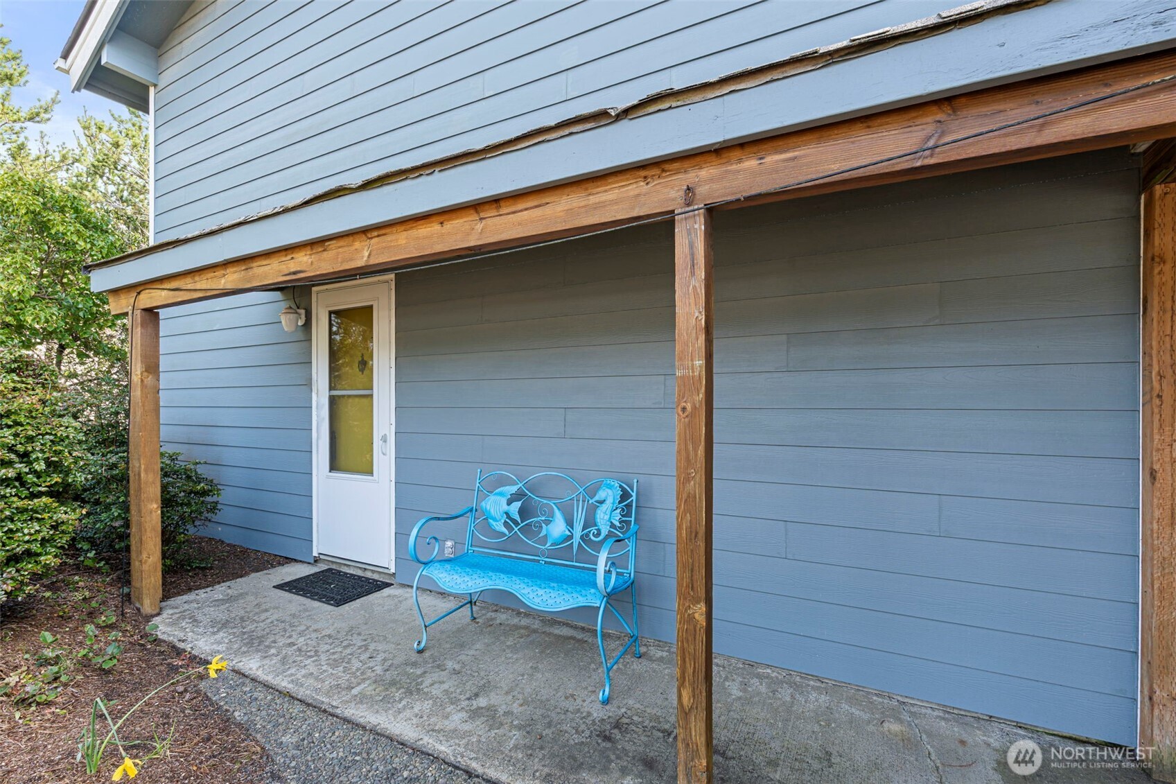 326 Harbor View Loop Southeast Ocean Shores, WA 98569 - Photo 29 of 38 a backyard of a house