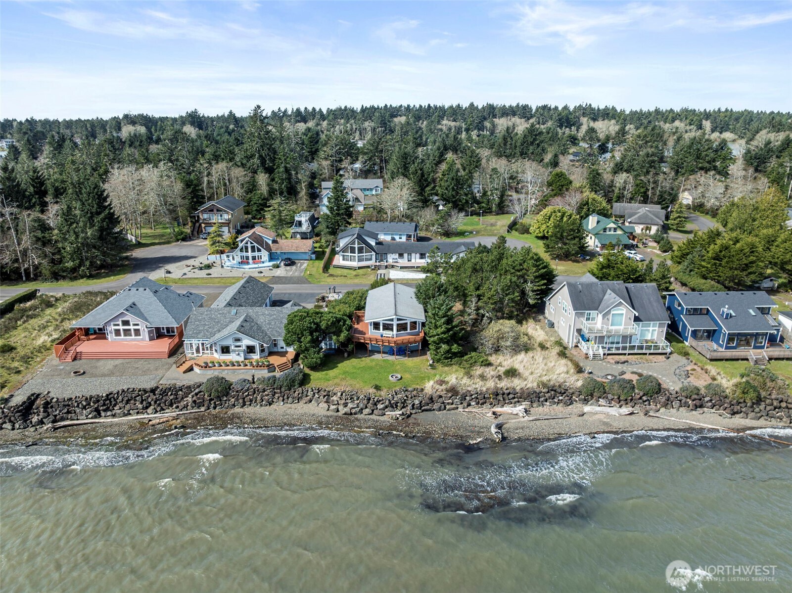 326 Harbor View Loop Southeast Ocean Shores, WA 98569 - Photo 34 of 38 a view of a lake with houses