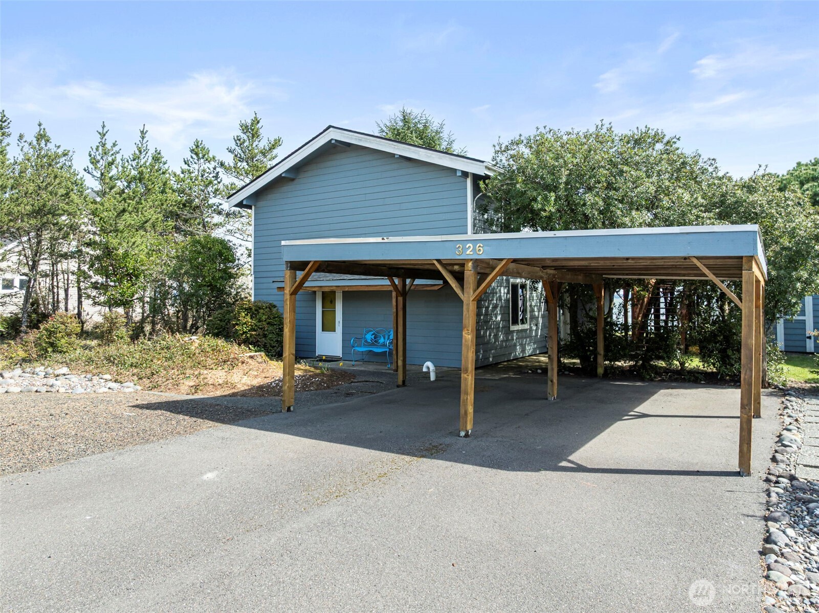 326 Harbor View Loop Southeast Ocean Shores, WA 98569 - Photo 37 of 38 a view of house with outdoor space and porch