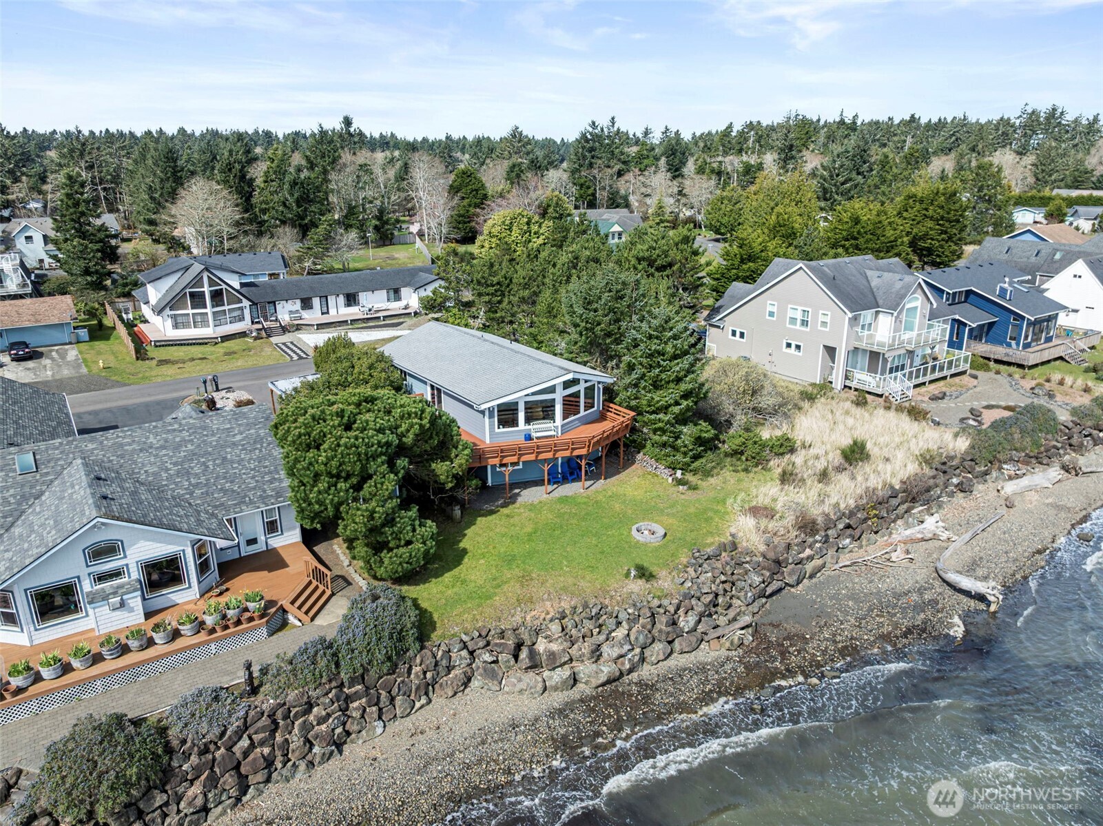326 Harbor View Loop Southeast Ocean Shores, WA 98569 - Photo 38 of 38 an aerial view of a house with a garden