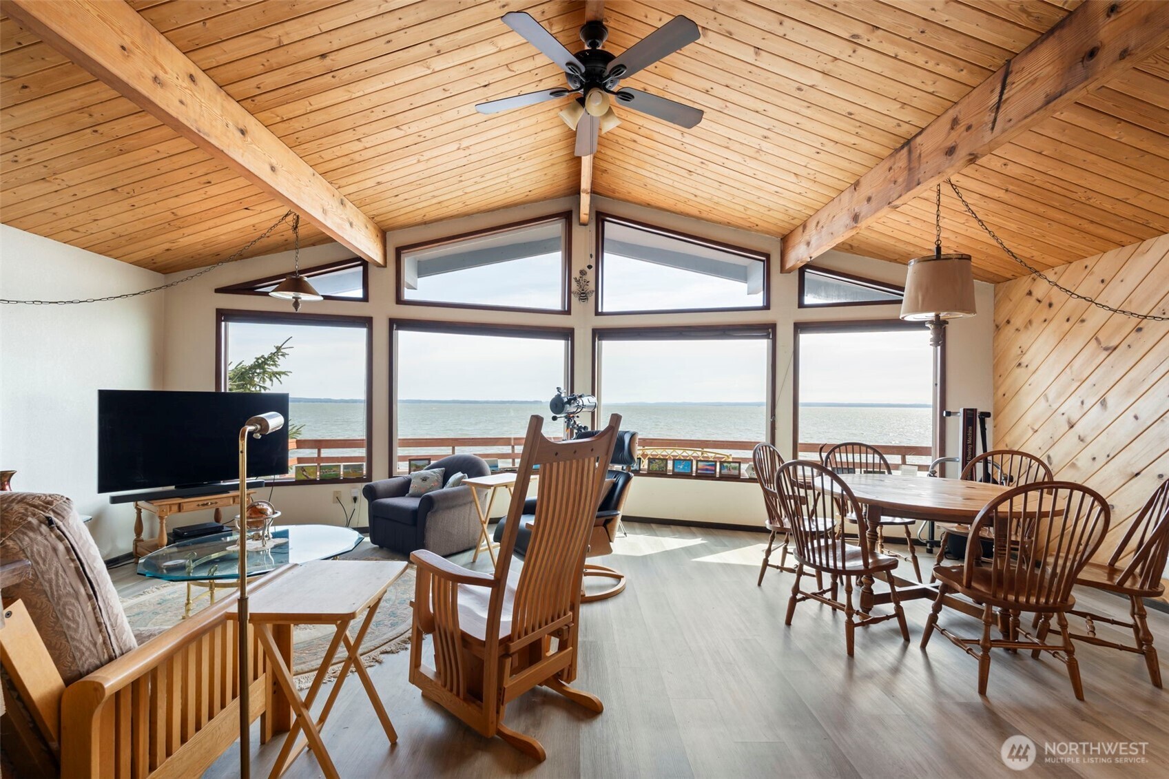 326 Harbor View Loop Southeast Ocean Shores, WA 98569 - Photo 7 of 38 a view of a dining room with furniture window and outside view