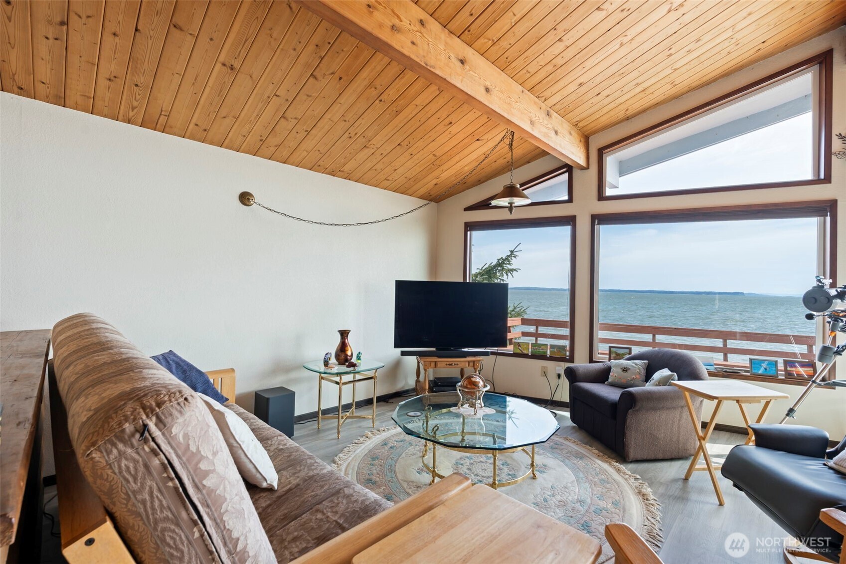 326 Harbor View Loop Southeast Ocean Shores, WA 98569 - Photo 9 of 38 a living room with furniture and a flat screen tv