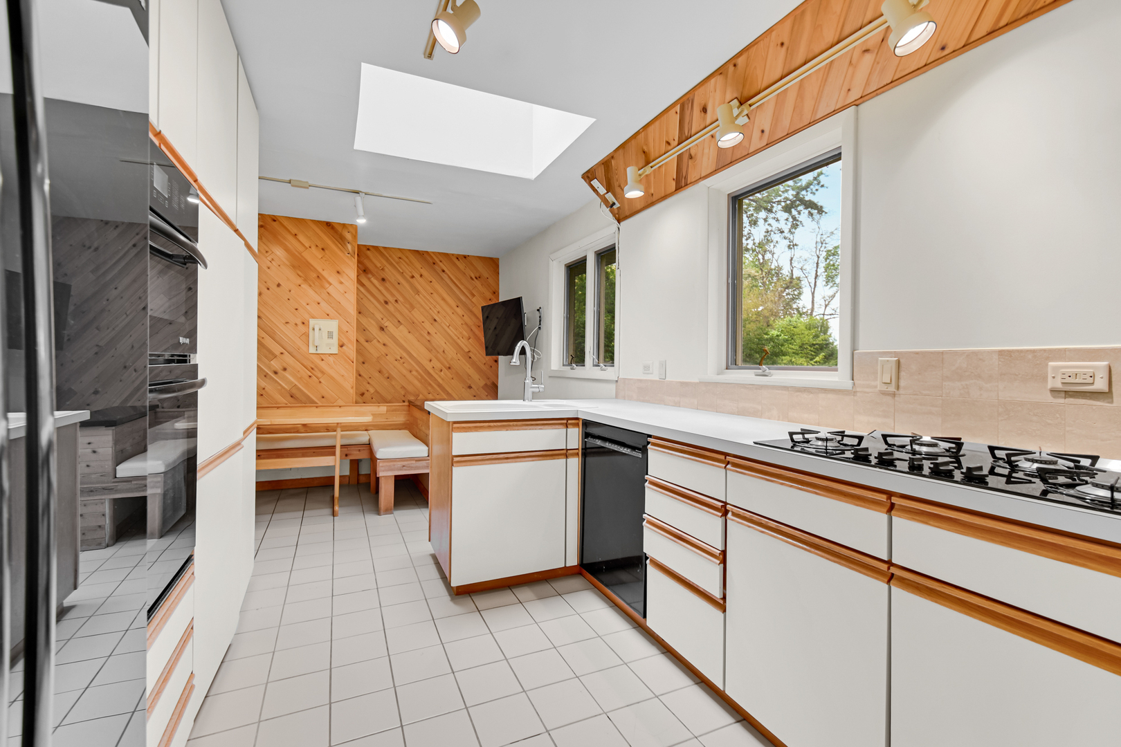 4112 Sunset Road Matteson, IL 60443 - Photo 9 of 28 a kitchen with a sink appliances cabinets and a counter top space