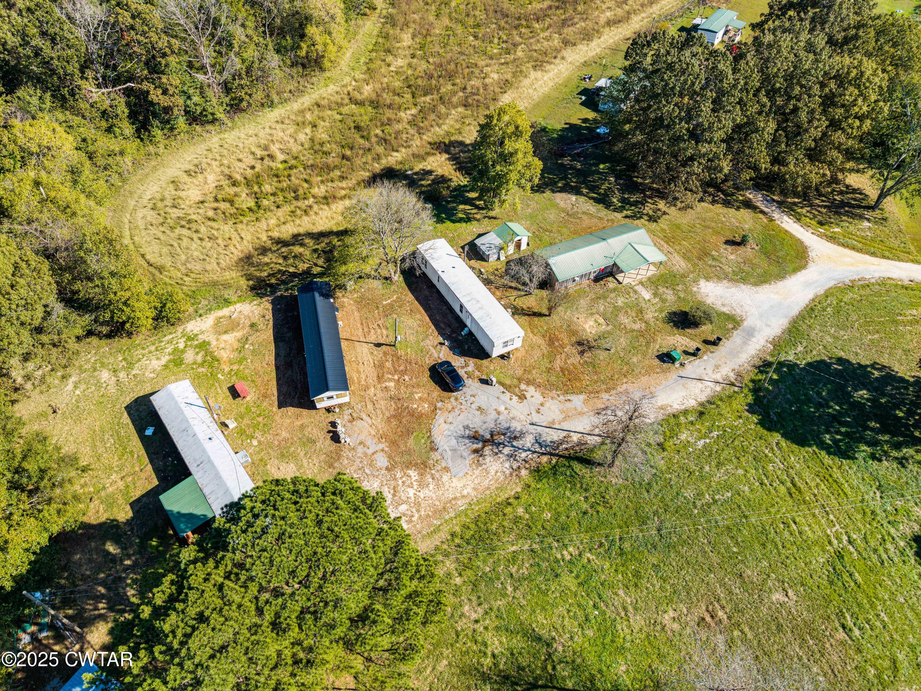 0 Charles Lane Cedar Grove, TN 38321 - Photo 5 of 16 a picture of table and chairs