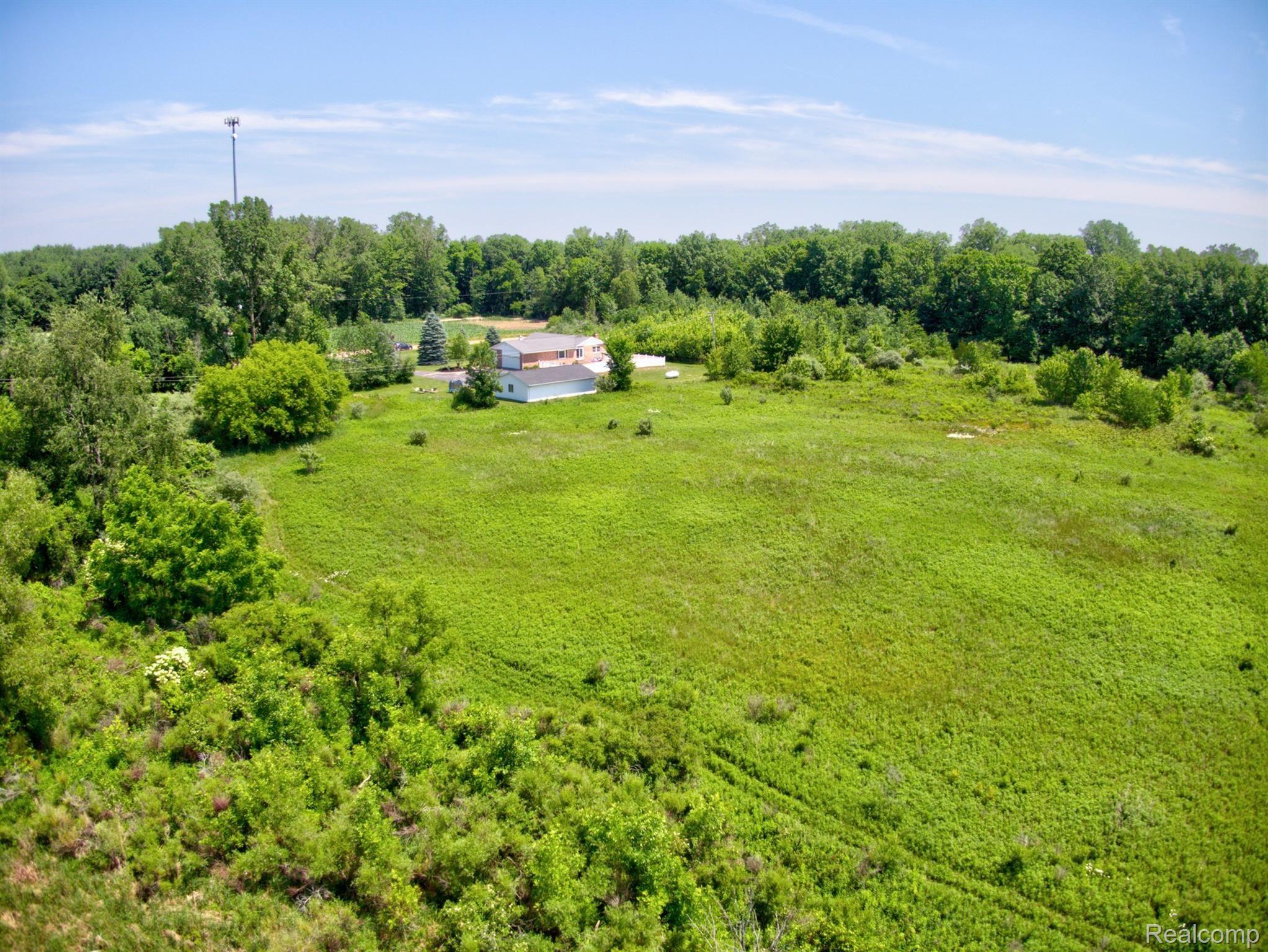 10575 West Sober Road Webberville, MI 48892 - Photo 46 of 46 A FINAL LOOK FROM THE BACK LEFT SIDE