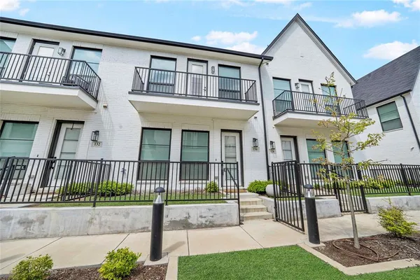 a front view of a house with a porch