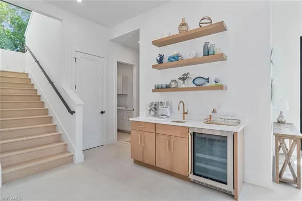 a view of cabinets with washer and dryer