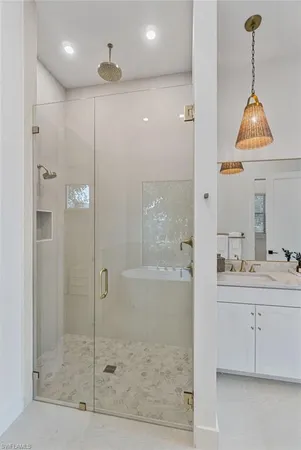 a white bath tub sitting in a bathroom
