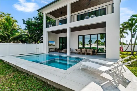 a view of a house with a swimming pool