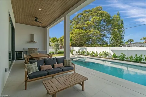 a living room with a couch and a table
