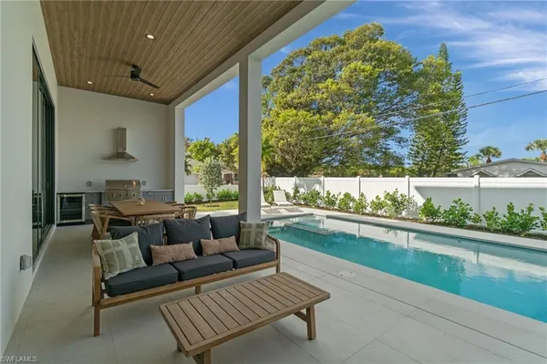a living room with a couch and a table