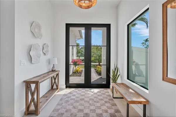 a view of an entryway with a door