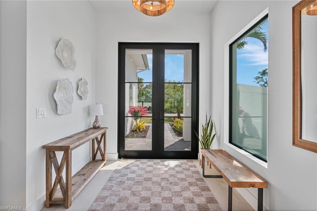 803 96th Avenue North Naples, FL 34108 - Photo 5 of 50 a view of an entryway with a door