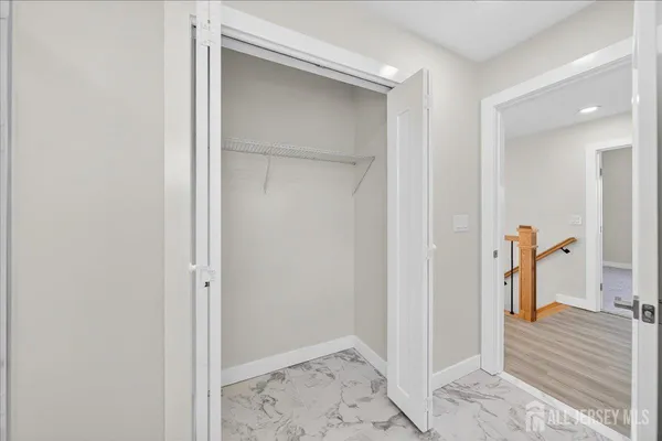 a view of a bedroom from the hallway