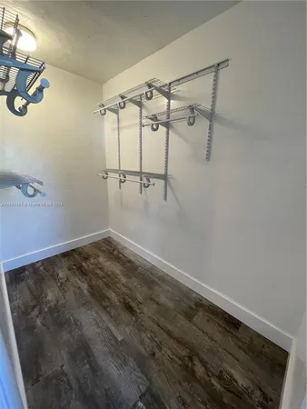 a view of a room with rack on the wall