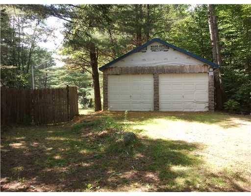 58 Smith Road Newport, ME 04953 - Photo 4 of 25 Exterior Front. Two car garage on...