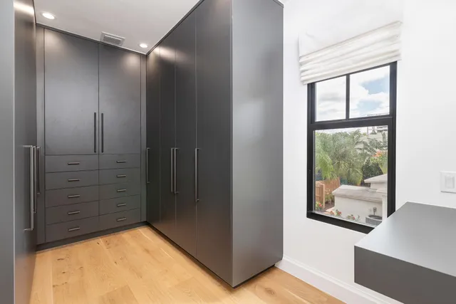 a view of room with window and hardwood floor