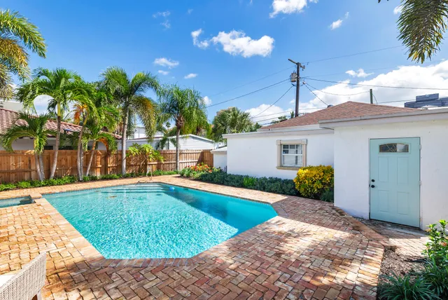 a view of a house with swimming pool
