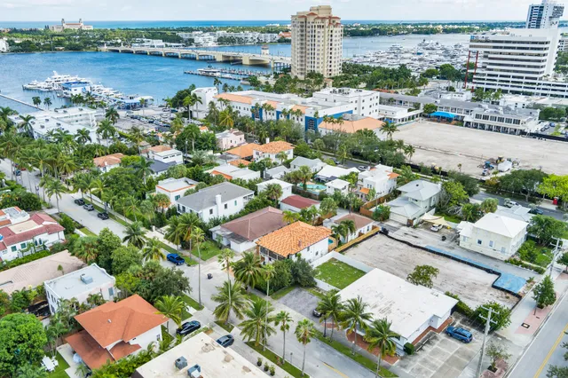 an aerial view of a city with lake view