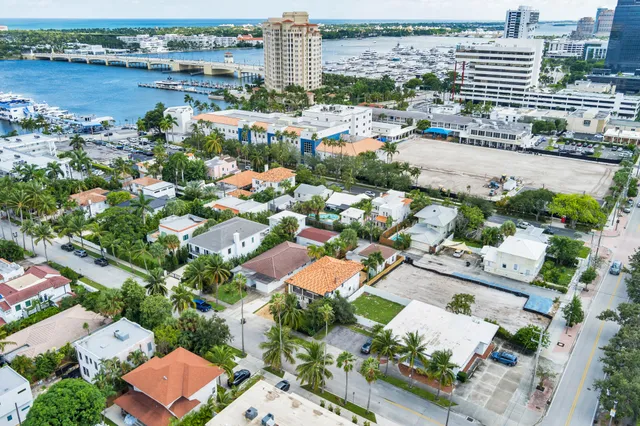 an aerial view of a city with lake view