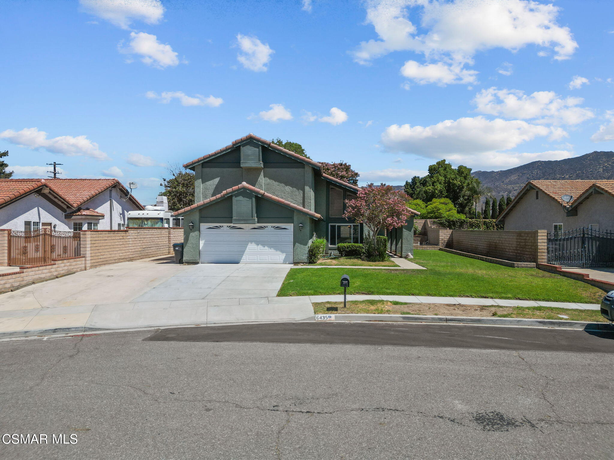 a view of house with a street