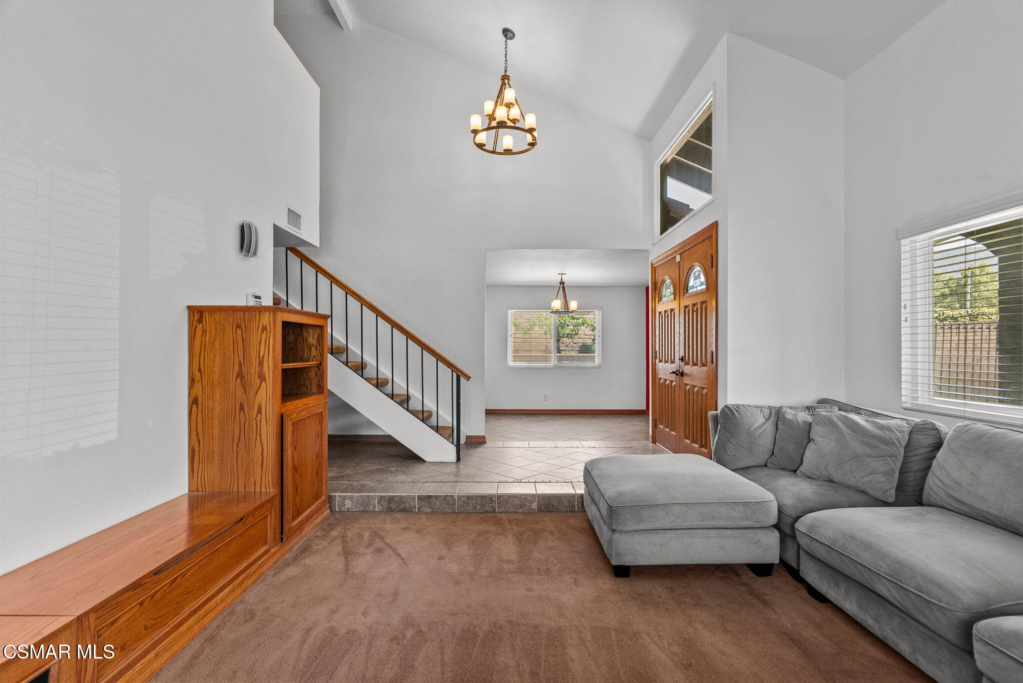 6435 Hazel Circle Simi Valley, CA 93063 - Photo 12 of 55 a living room with furniture and a chandelier