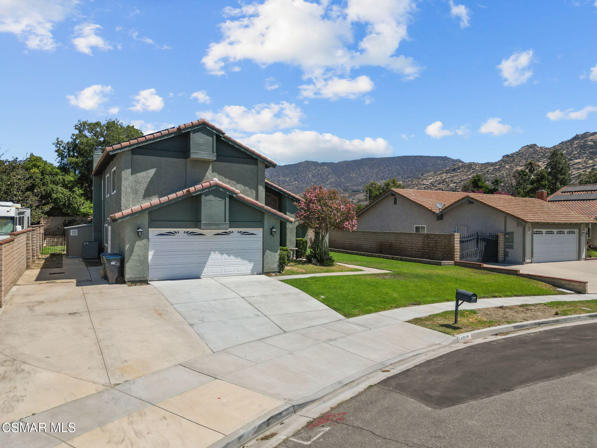 6435 Hazel Circle Simi Valley, CA 93063 - Photo 2 of 55 a front view of house with yard and green space