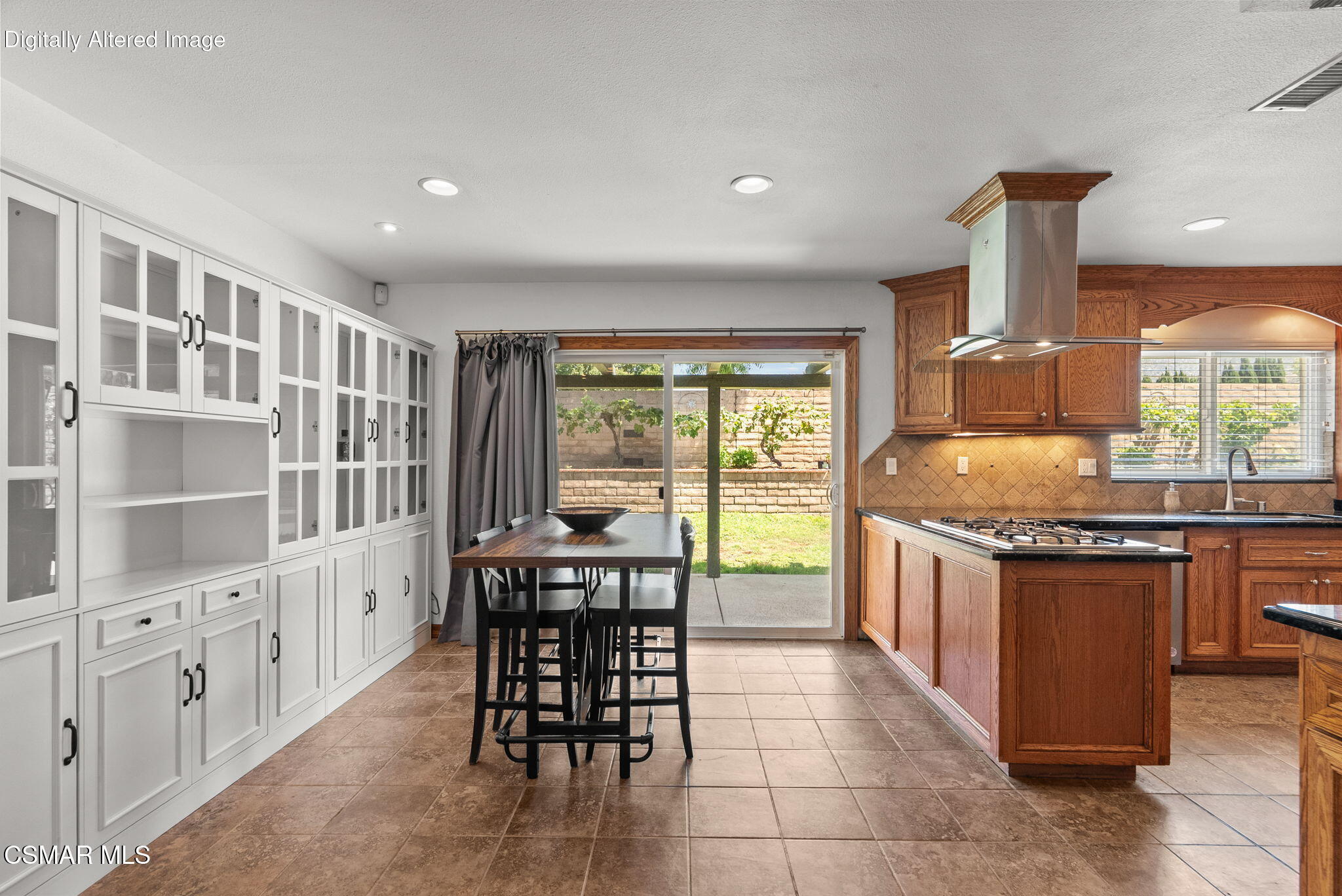 6435 Hazel Circle Simi Valley, CA 93063 - Photo 24 of 55 a kitchen with stainless steel appliances granite countertop a stove a sink and a refrigerator