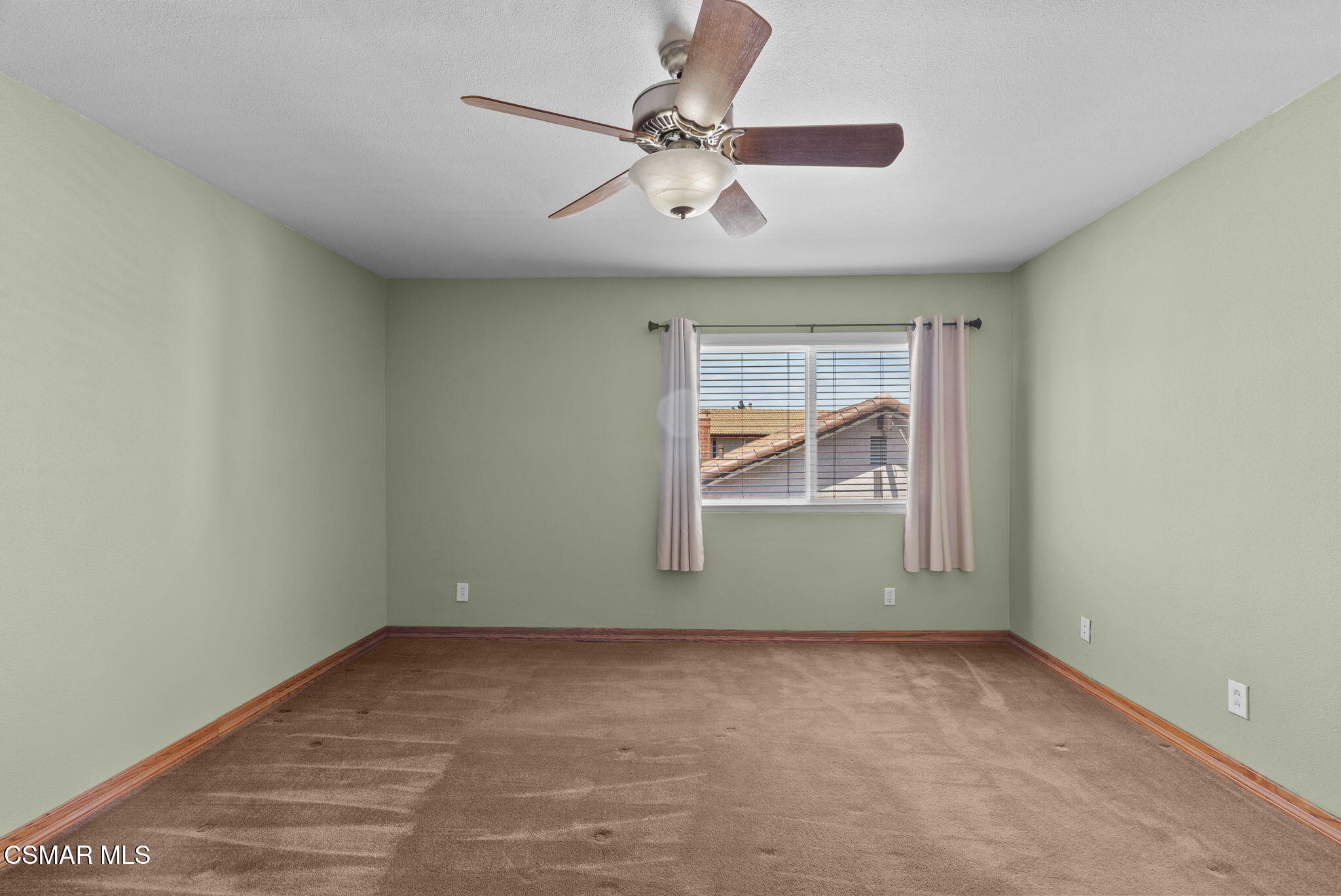 6435 Hazel Circle Simi Valley, CA 93063 - Photo 30 of 55 an empty room with ceiling fan and window