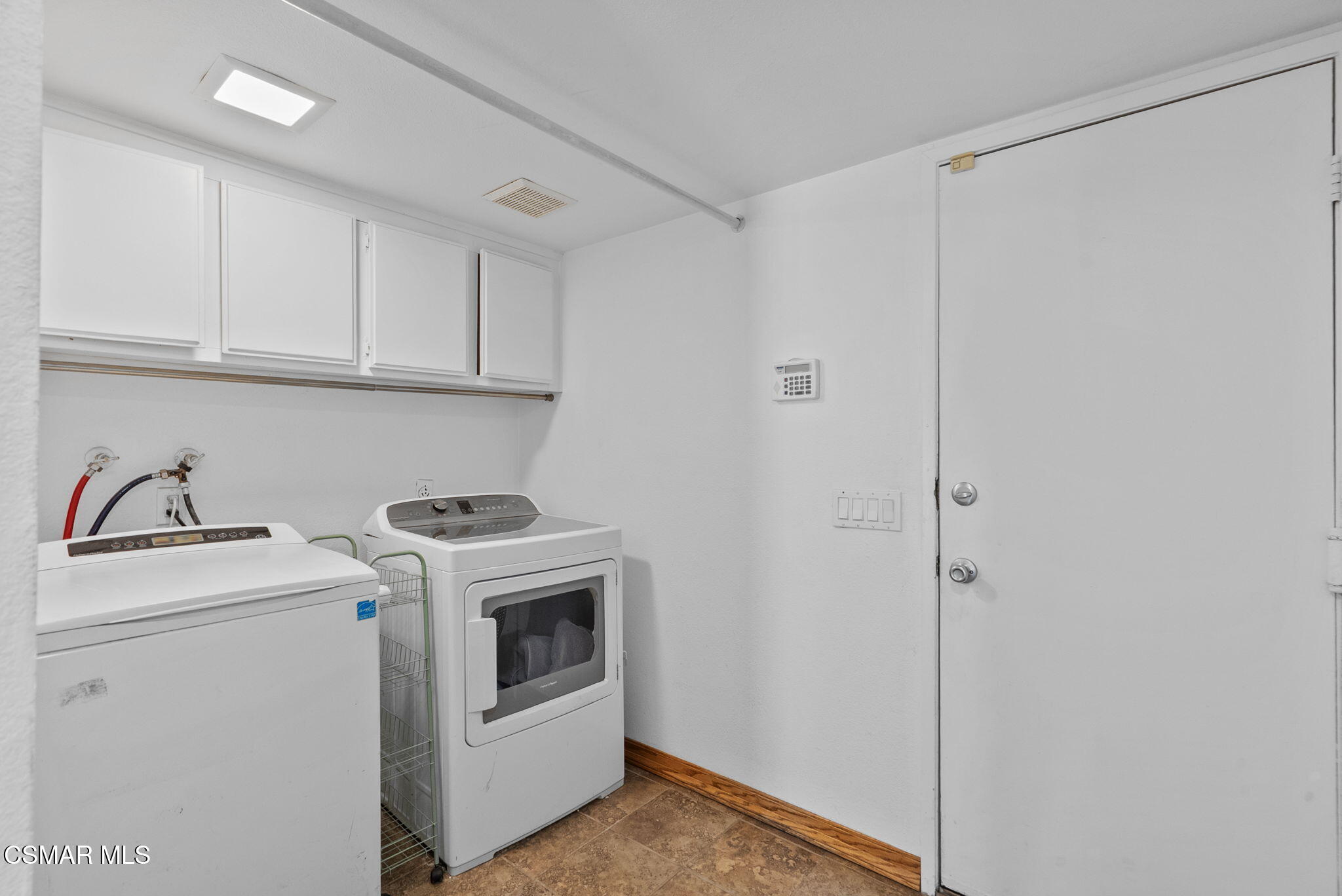 6435 Hazel Circle Simi Valley, CA 93063 - Photo 34 of 55 a view of a storage and utility room with washer and dryer