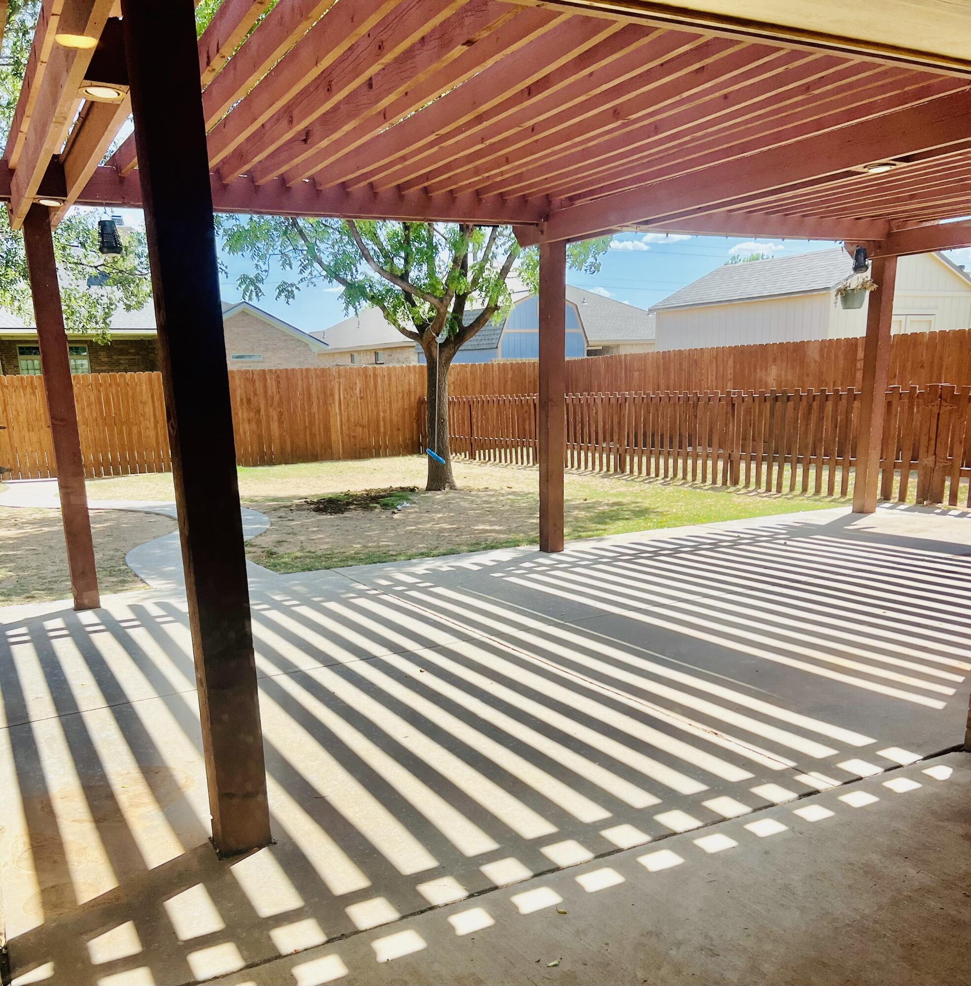 5513 104th Street Lubbock, TX 79424 - Photo 8 of 10 a view of a room with wooden floor
