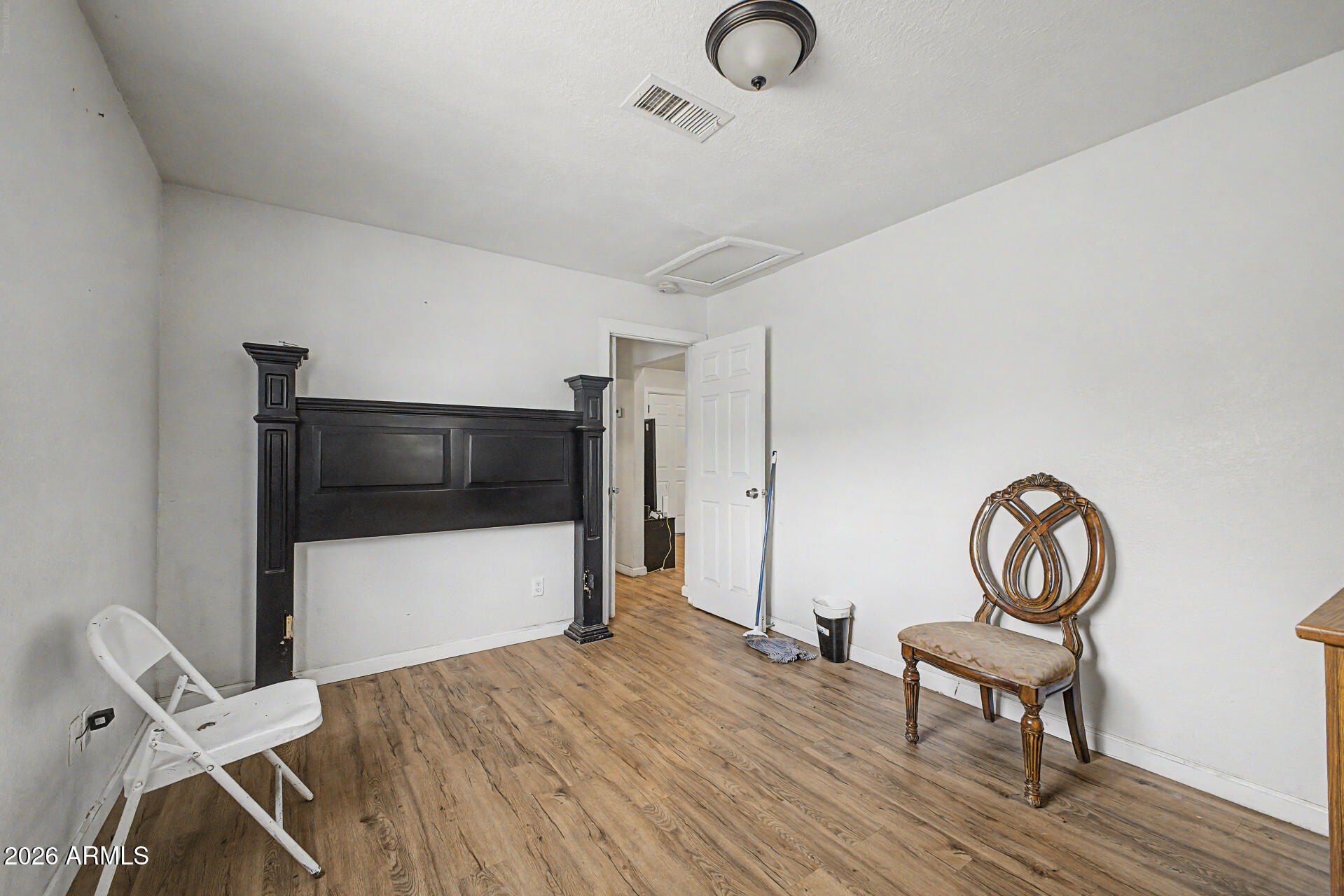 1030 North 28th Street Phoenix, AZ 85008 - Photo 13 of 24 a view of a livingroom with furniture and a flat screen tv