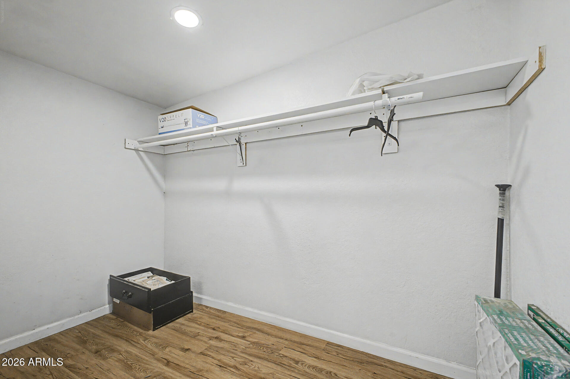 1030 North 28th Street Phoenix, AZ 85008 - Photo 15 of 24 a view of a closet area with wooden floor