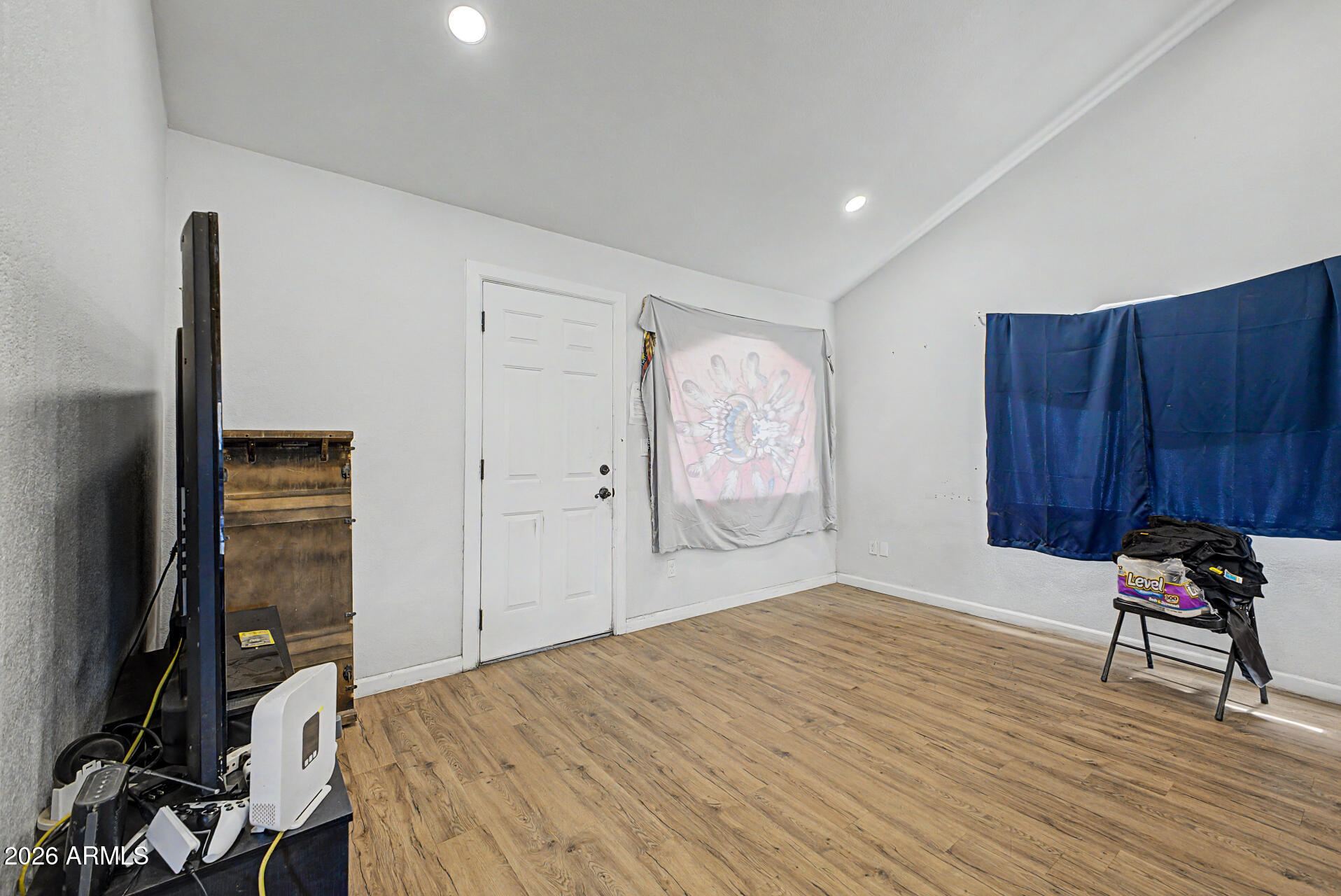 1030 North 28th Street Phoenix, AZ 85008 - Photo 5 of 24 a bedroom with a bed and a closet