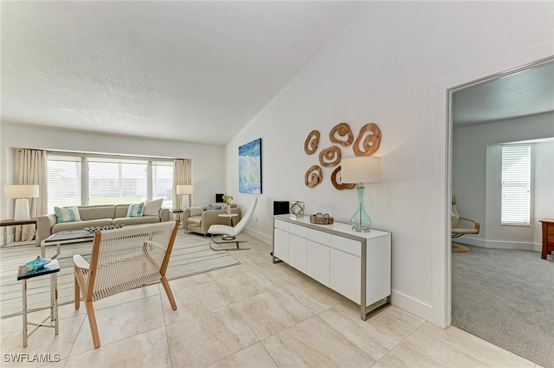 2436 Rosa Lane Punta Gorda, FL 33950 - Photo 23 of 48 a living room with furniture and window