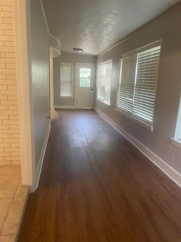 a view of livingroom with hardwood floor and window