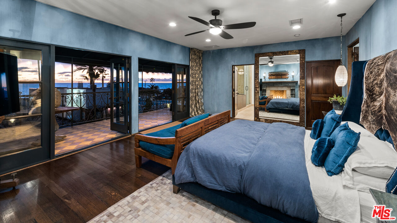 7546 Rindge Avenue Playa del Rey, CA 90293 - Photo 23 of 67 a bedroom with a large bed and a view of balcony